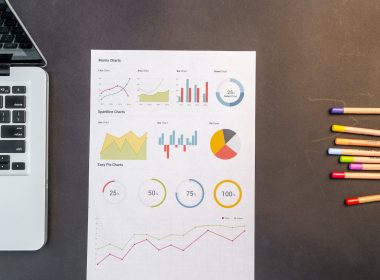 charts on black wooden table